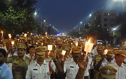 Police officials pay homage to victims of road accidents. (Photo | P Ravindra Babu, EPS)