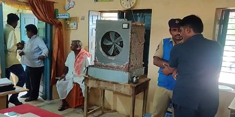 The rattled staff of Chigurumamidi Tahsildar's office in Karimnagar district. (Videograb)