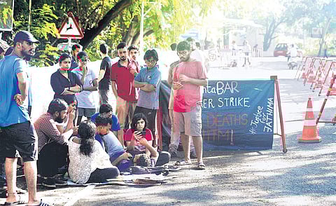 Azhar and Justin, students from Humanities and Social Science department of IIT-Madras, sit on hunger strike demanding an internal probe into the death of Fathima Latheef, on the campus in Chennai on Monday | DEBADATTA MALLLICK