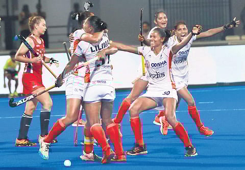 India women’s hockey players celebrate after scoring against USA during their Olympic qualfier at the Kalinga Stadium in Bhubaneswar on Friday | IRFANA