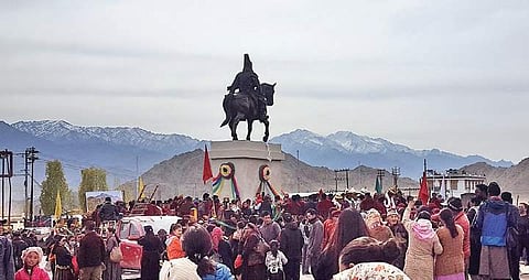 Locals cheer after the statue of Sengge Namgyal, the 17th-century Namgyal dynasty King of Ladakh, was unveiled in Ladakh on Friday (Photo| Angela Paljor)