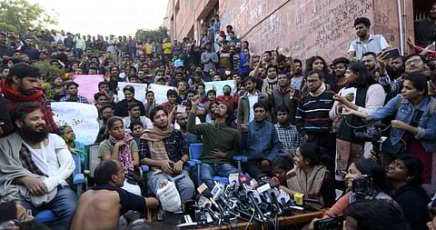 JNU students and their leaders who got injuries in Mondays police lathicharge shout slogans during a press conference at the university campus in New Delhi Tuesday Nov 19 2019. | (Photo | Arun Kumar/EPS)