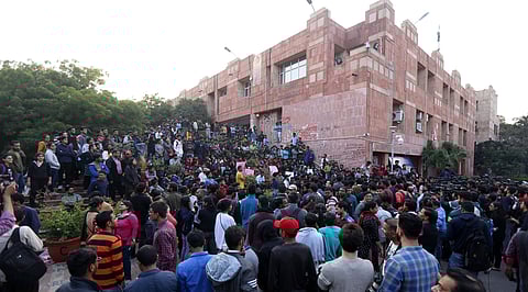 JNU students and their leaders who got injuries in Mondays police lathicharge shout slogans during a press conference at the university campus in New Delhi Tuesday Nov 19 2019. | (Photo | Arun Kumar/EPS)