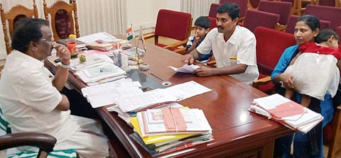 Maria and her husband Rodimon Varghese meet Culture Minister A K Balan (Photo | Express)