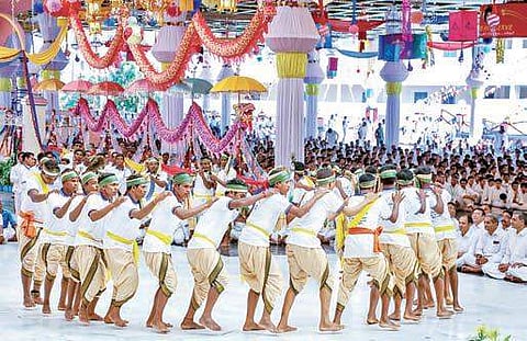 Tribals performing dance at Prasanthi Nilayam on Wednesday | Express