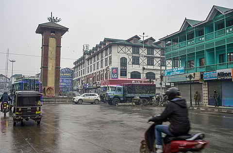 Traffic ply on roads at Lal Chowk during shutdown in Srinagar Thursday Nov. 21 2019. (Photo | PTI)