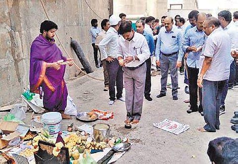 MEIL representatives and irrigation department officials perform puja at Polavaram project before launching concrete works| Express