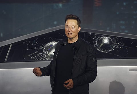Tesla CEO Elon Musk introduces the Cybertruck at Tesla's design studio Thursday. (Photo | AP)