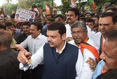 Newly sworn-in Maharashtra Chief Minister Devendra Fadnavis arrives at state's BJP office in Mumbai Saturday Nov. 23 2019. (Photo | PTI)