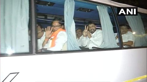 Bus carrying Nationalist Congress Party (NCP) MLAs reaches Hotel Hyatt from Hotel Renaissance, where the MLAs were lodged earlier. (Photo | ANI Twitter)