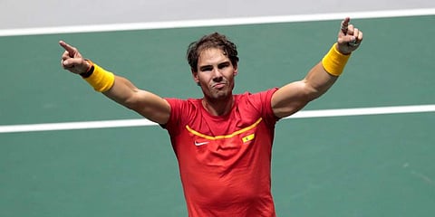 Spain's Rafael Nadal celebrates after winning their Davis Cup semifinal doubles match with his partner Feliciano Lopez against Great Britain's Jamie Murray and Neal Skupski in Madrid. (Photo | AP)