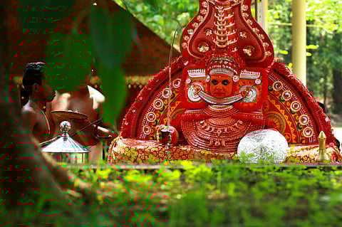 Theyyam is a ritual art form in which the performer, believed to be possessed by God, thrashes devotees and no one would complain. (Photo | EPS)