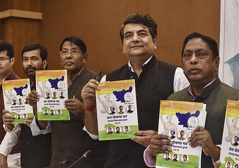 Jharkhand Congress in-charge RPN Singh state Congress President Rameshwar Oraon and others release party's manifesto for Jharkhand Assembly elections in Ranchi Sunday Nov. 24 2019. (Photo | PTI)