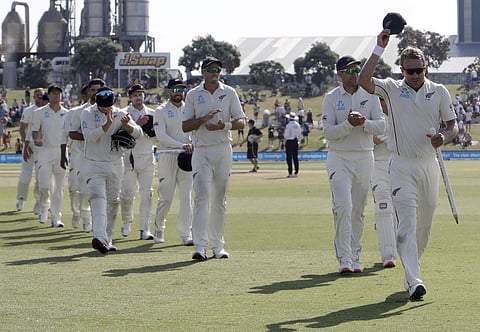 New Zealand's Neil Wagner, right, leads his teammates from the field at the end of play. (Photo | AP)