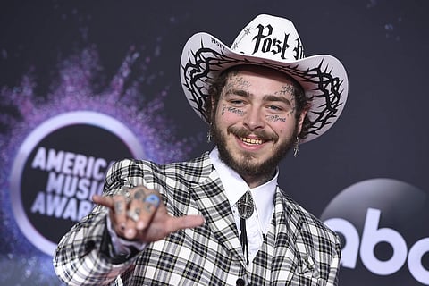 POST MALONE: American rapper Post Malone got seven nominations making him the most nominated artist this year and won favourite rap/hip-hop album for Hollywood’s Bleeding. (Photo | AP)
