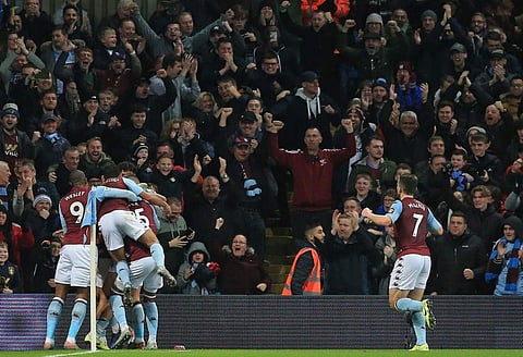 Aston Villa's Irish midfielder Conor Hourihane is mobbed by teammates after scoring the opening goal during the English Premier League football match between Aston Villa and Newcastle United at Villa Park in Birmingham. (Photo | AFP)