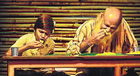 A still from 'Karuppu Durai'.