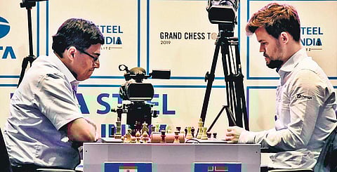 Viswanathan Anand suffered third straight loss against Magnus Carlsen on Tuesday