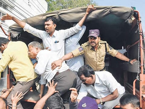 Employees in a detention van at Ranigunj depot in Hyderabad on Tuesday. (Photo | RVK Rao, EPS)
