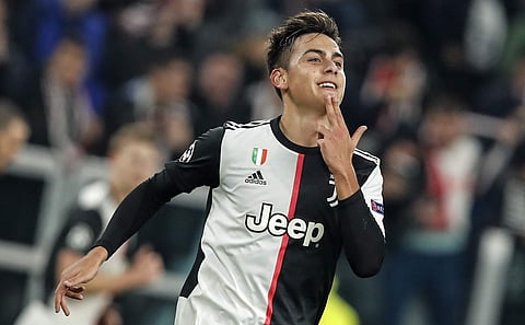 Juventus' Paulo Dybala celebrates after scoring against Atletico Madrid. (Photo | AP)