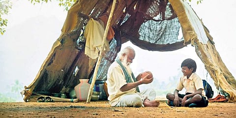 A still from 'Karuppu Durai'.