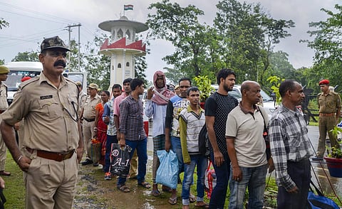 Image of a people queued up at a detention centre used for representational purpose only.