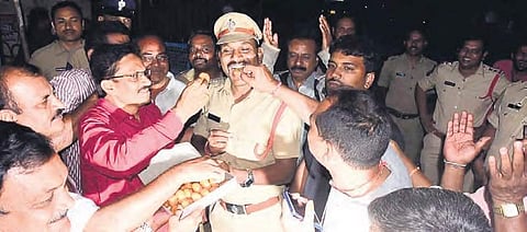 The TSRTC employees distribute sweets as they celebrate CM KCR’s announcement, in Khammam on Thursday.