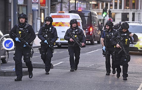 Police on Cannon Street in London near the scene of an incident on London Bridge in central London following a police incident, Friday, Nov. 29, 2019. (Photo | AP)
