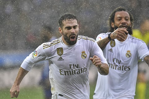 Real Madrid's Dani Carvajal, left, celebrates scoring his side's second goal with teammate Marcelo. (Photo | AP)
