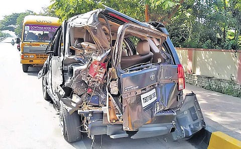 The car that met with the accident when it overturned and hit a footpath near PVNR Expressway in Hyderabad during the early hours of Friday. (Photo | EPS)