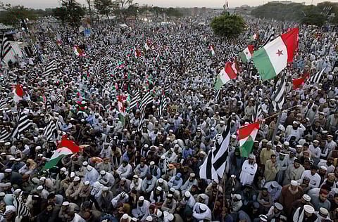 Supporters of the Jamiat Ulema-e-Islam party participate in an anti-government march in Islamabad. (Photo| AP)