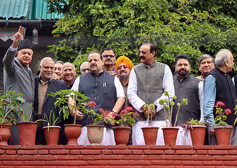 National Conference President Farooq Abdullah waves towards media persons during a meeting with party leaders at his residence in Gupkar in Srinagar Sunday Oct. 6 2019. | (File | PTI)
