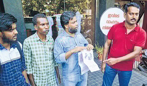 Human rights activist C P Rashid, who is demanding withdrawal of UAPA charges against political activists, speaking to reporters in Kozhikode | Manu R Mavelil