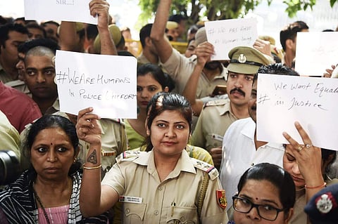 Delhi Police officials held protest demonstration against the recent attack by lawyers at the Police headquarters in New Delhi on Tuesday. (Photo | Parveen Negi, EPS)