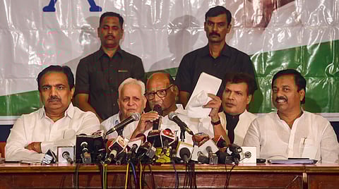 NCP chief Sharad Pawar along with party leaders Jayant Patil and Sunil Tatkare addresses a press conference in Mumbai (Photo| PTI)