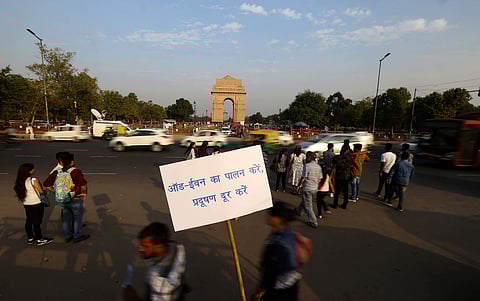A singn board display on India Gate to follow odd even in New Delhi on Wednesday. | (Photo | Arun Kumar P/EPS)