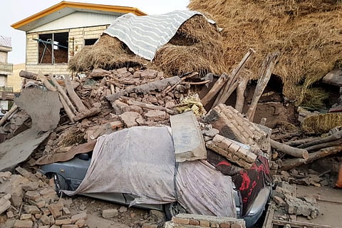 A car lays smashed by debris from an earthquake in Varankesh village in Eastern Azerbaijan province, some 250 miles (400 kilometers) northwest of the capital Tehran, Iran, Friday, Nov. 8, 2019. (Photo | AP)