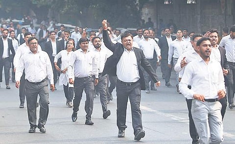 Lawyers shout slogans against the police during a protest outiside Tis Hazari Court. (Photo | Arun Kumar, EPS)