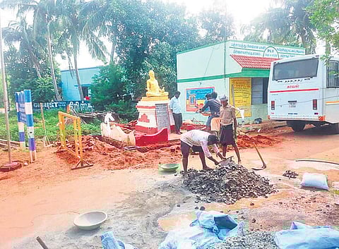 The work of constructing an enclosure for the Tiruvalluvar statue in Vallam underway on Thursday. | (Photo | EPS)