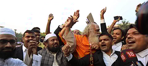 Nirvani Akhara chief Mahant Dharam Das along with Maulana Suhaib Qasmi, President, Ayodhya Varti Committee and others after the Ram janmbhumi- Babri masjid case hearing at Supreme court in New Delhi on Wednesday. | (Arun Kumar P | EPS)