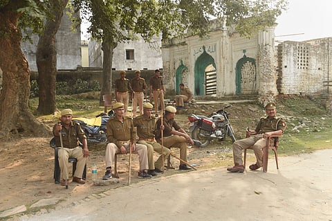 Police personnel guard the premises near the disputed Ram Janambhoomi-Babri Masjid site as the verdict date nears in Ayodhya Friday Nov. 8 2019. (Photo | PTI)