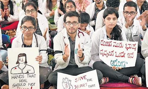 Doctors protest outside Victoria Hospital on Friday | NAGARAJA GADEKAL