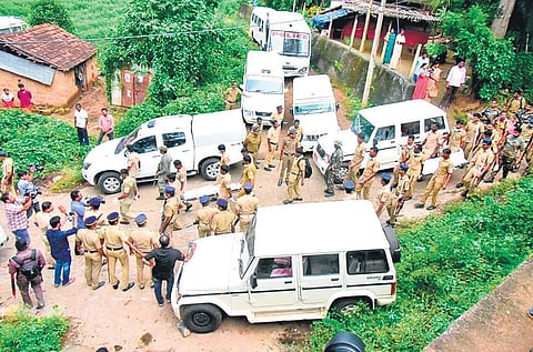 The bodies of Maoists being brought out from the Manjikandi forests in Attappadi | file pic