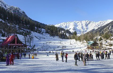 Tourists during a visit to the Solang Valley after it received fresh snowfall in Manali Himachal Pradesh Sunday Dec. 1 2019. (Photo | PTI)