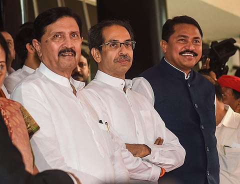 Maharashtra Chief Minister Uddhav Thackeray and State Assembly Speaker Nana Patole wait to receive Maharashtra Governor Bhagat Singh Koshyari at Vidhan Bhavan for State Assembly session in Mumbai Sunday Dec. 1 2019. (Photo | PTI)