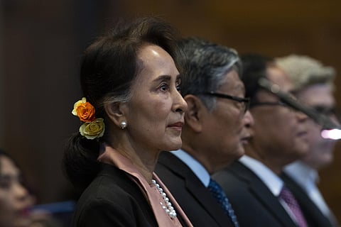 Myanmar's leader Aung San Suu Kyi stands in the court room of the International Court of Justice for the first day of three days of hearings in The Hague. (Photo | AP)