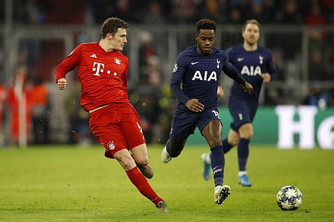 Tottenham Hotspur's English defender Kyle Walker-Peters (R) vies with Bayern Munich's French defender Benjamin Pavard during the UEFA Champions League Group B football match. (Photo | AFP)