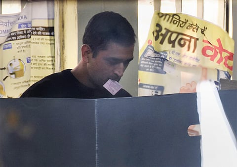 Former Indian cricket captain MS Dhoni casts his vote at a polling station during the third phase of Jharkhand Assembly elections, in Ranchi (Photo| PTI)