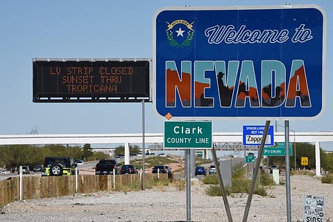 A sign welcoming travellers, who are heading towards Las Vegas, to Nevada (File photo| AFP)