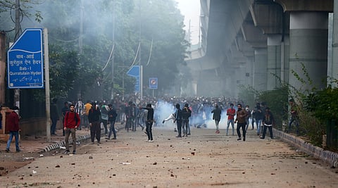 Jamia university students protesting against the passing of Citizenship Amendment Bill in New Delhi (Express photo| Parveen Negi)